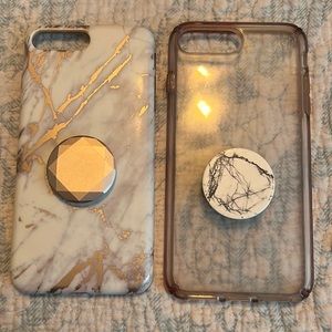 Two iPhone plus cases one of them is a speck other is one from Walmart.